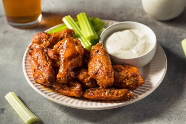 Homemade,Spicy,Buffalo,Chicken,Wings,With,Celery,And,Blue,Cheese